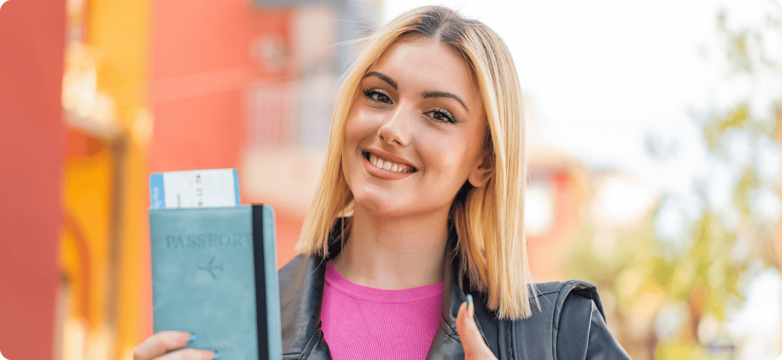 A barbie-looking woman holding her passport while showing thumbs up.